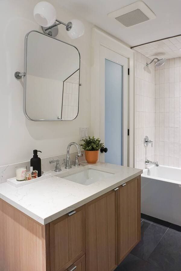 Niagara bathroom renovation with wooden vanity and bathtub