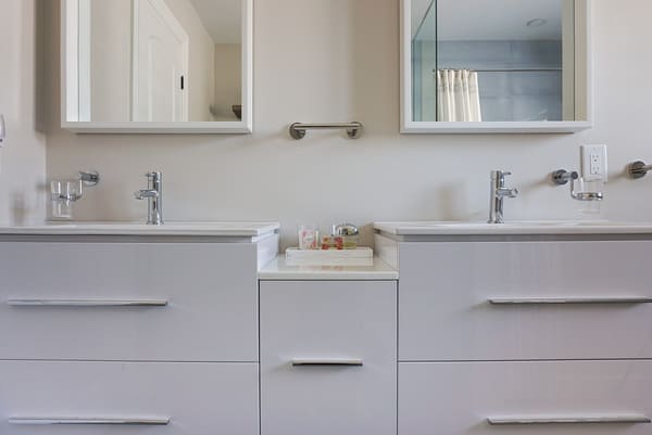 Niagara bathroom renovation white multi-level vanity with chrome hardware
