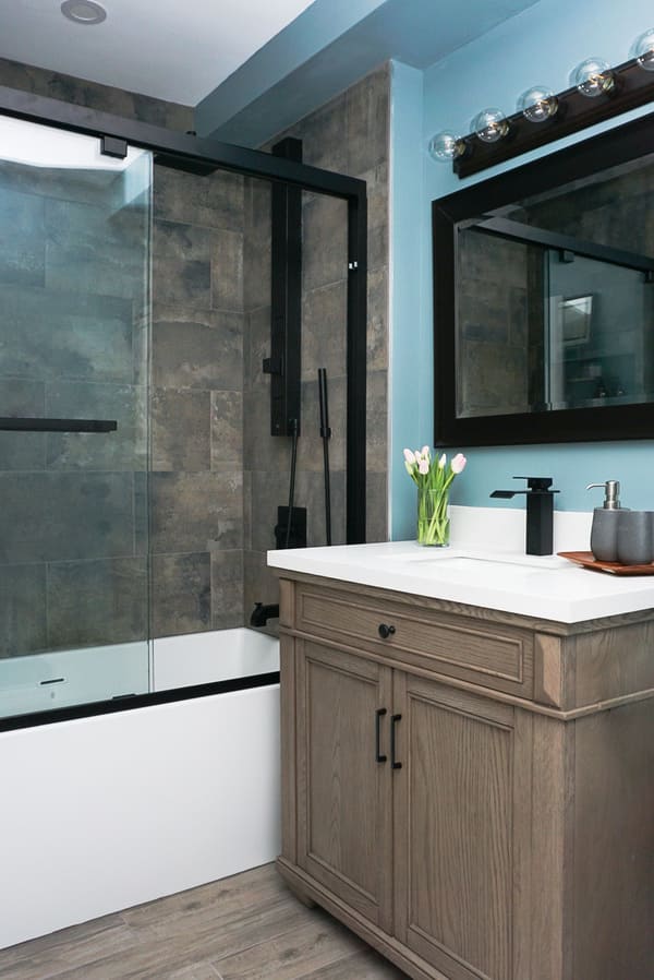 Niagara Bathroom Renovation Wooden Vanity with Brown Tiled Shower